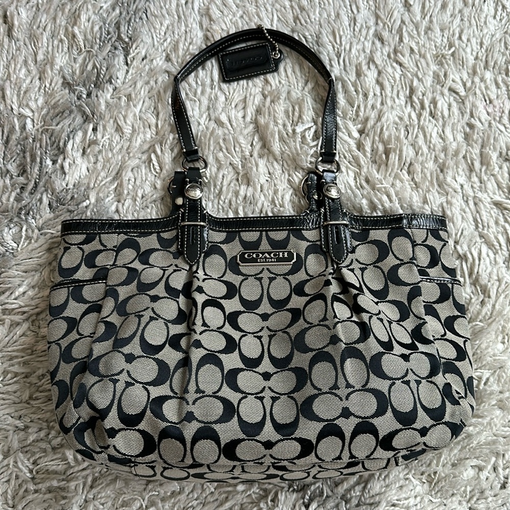 Black Coach tote bag with baby blue interior